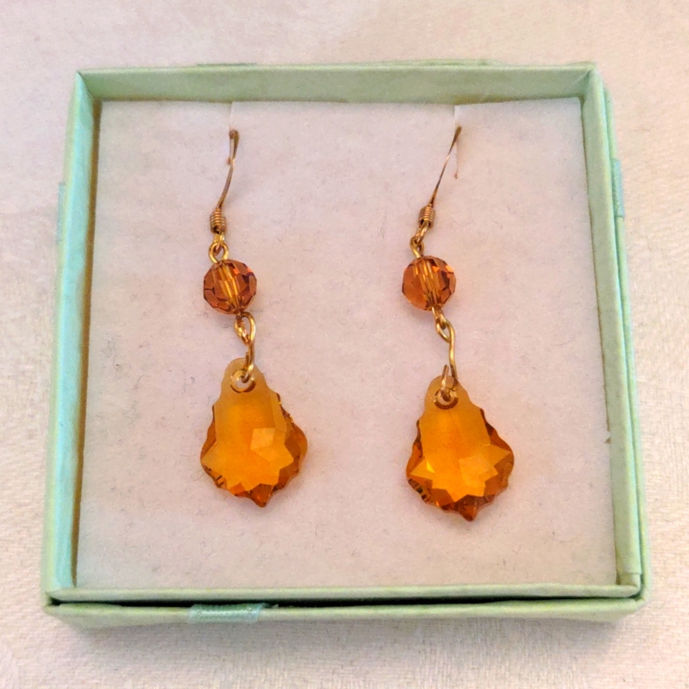 New Swarovski Crystal  Drop gold plated earrings.  2" dangle, Genuine